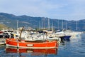 Pleasure boats and yachts at the pier on the waterfront of the r Royalty Free Stock Photo