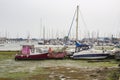 Pleasure craft moored in the Marina on the tidal River Hamble at