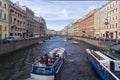 Pleasure and sightseeing boats with tourists. Saint Petersburg, Russia