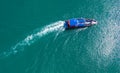 Pleasure white yacht coral reef in blue transparent turquoise water sea. Aerial top view