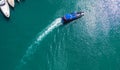 Pleasure white yacht coral reef in blue transparent turquoise water sea. Aerial top view