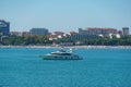 Pleasure yacht in the background of the resort town of Gelendzhik