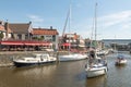 Pleasure yachts and sailboats in the port of Lemmer in Friesland, Netherlands. Royalty Free Stock Photo