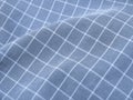 Pleated checkered blue fabric Royalty Free Stock Photo