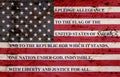 The pledge of allegiance on weathered flag Royalty Free Stock Photo