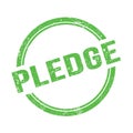 PLEDGE text written on green grungy round stamp