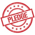 PLEDGE text written on red vintage stamp