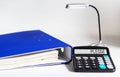 Pledge - word written on calculator display, deposit, guarantee, pledge, promise, pledge concept. Royalty Free Stock Photo