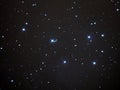 Universe stars, Pleiades opern cluster M45 in night sky Royalty Free Stock Photo