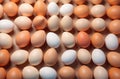 plenty of brown and white eggs on beige background, top view. natural healthy food flatlay, Easter