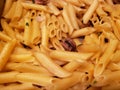 plenty of cooked pasta for lunch, traditional Italian food, background and texture