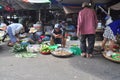 Plenty of fruits and grocery are for sale in a street market in Vietnam