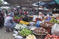 Plenty of fruits and grocery are for sale in a street market in Vietnam