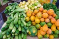 Plenty of fruits and vegetables, cucumbers, coconuts, passion fruits, salad Royalty Free Stock Photo