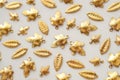 Plenty of gold shining metal leaves. Jewelry findings Royalty Free Stock Photo