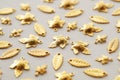 Plenty of gold shining metal leaves. Jewelry findings Royalty Free Stock Photo