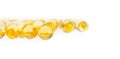 Plenty scattered yellow transparent capsule fish oil