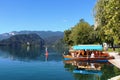 Pletna boats and paddle board, Lake Bled, Slovenia Royalty Free Stock Photo