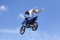 Biker doing a freestyle trick with his dirt bike