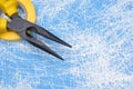Pliers hand tool on blue Royalty Free Stock Photo