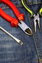 Pliers red screwdriver work tool electrician engineering background Royalty Free Stock Photo