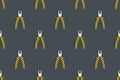 Pliers seamless pattern. Metal pliers with rubber striped grips.