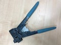 The pliers tool with blue handles for crimping a connector to network Royalty Free Stock Photo
