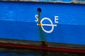 Plimsol mark on the side of a blue ferry.. Royalty Free Stock Photo
