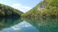 Plitvice Lakes - reflection of the sky and landscape on the surface of Lake Croatia - May 2022 Royalty Free Stock Photo