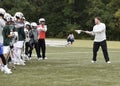 PLL, professional lacrosse player, Matt Rambo, teaching young lacrosse players at a clinic. Royalty Free Stock Photo