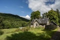 Plodda Cottage in Douglas Fir Country