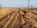Plot railway. Top view on the rails. High-voltage lines for electric trains Royalty Free Stock Photo