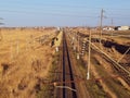 Plot railway. Top view on the rails. High-voltage lines for electric trains Royalty Free Stock Photo