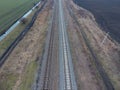 Plot railway. Top view on the rails. High-voltage power lines for electric trains Royalty Free Stock Photo