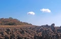 Ploughed field with brown soil, blue sky Royalty Free Stock Photo