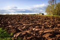 Ploughed field and house Royalty Free Stock Photo