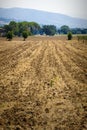 Ploughed field of land for rural cultivation. Royalty Free Stock Photo