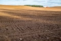 Ploughed field landscape in early spring Royalty Free Stock Photo