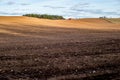 Ploughed field landscape in early spring Royalty Free Stock Photo