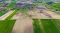 Ploughed or Plowed and Cultivated Fields in Farm. Geometric Fields Shapes. Aerial Drone View