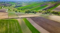 Ploughed or Plowed and Cultivated Fields in Farm. Geometric Fields Shapes. Aerial Drone View