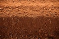 Ploughed red clay soil agriculture fields