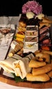 A ploughmans platter with a selection of meats, breads, cheeses and dips Royalty Free Stock Photo