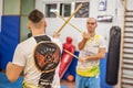 Kapap students practice sticks fighting techniques on Self Defense seminar