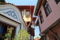 PLOVDIV, BULGARIA: A narrow street with colorful traditional houses in the old town of Plovdiv