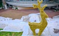 Plovdiv Roman Stadium and golden yellow colored deer body
