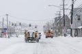 Plow trucks on street after storm 2015