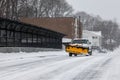 Plow trucks on street after storm 2015