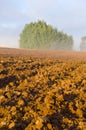 Plowed autumn farm field and morning mist Royalty Free Stock Photo