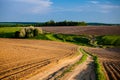 Plowed farming fields in rural area. Spring landscape Royalty Free Stock Photo